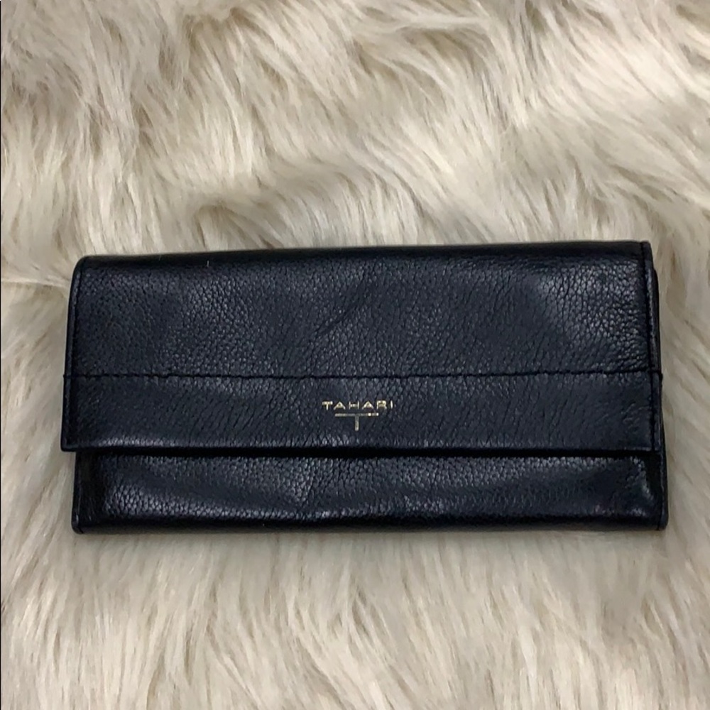 T Tahari black pebbled leather flap-over wallet